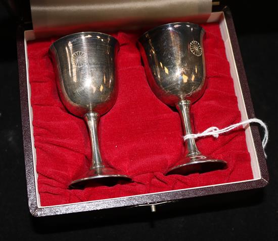 A cased pair of Japanese silver saki cups (a gift to the vendor upon the state visit of Emperor Hirohito in 1971), 3.25in.